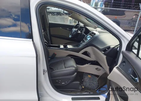 2019 Lincoln Nautilus Reserve from USA, damaged, VIN 2LMPJ8L98KBL46092